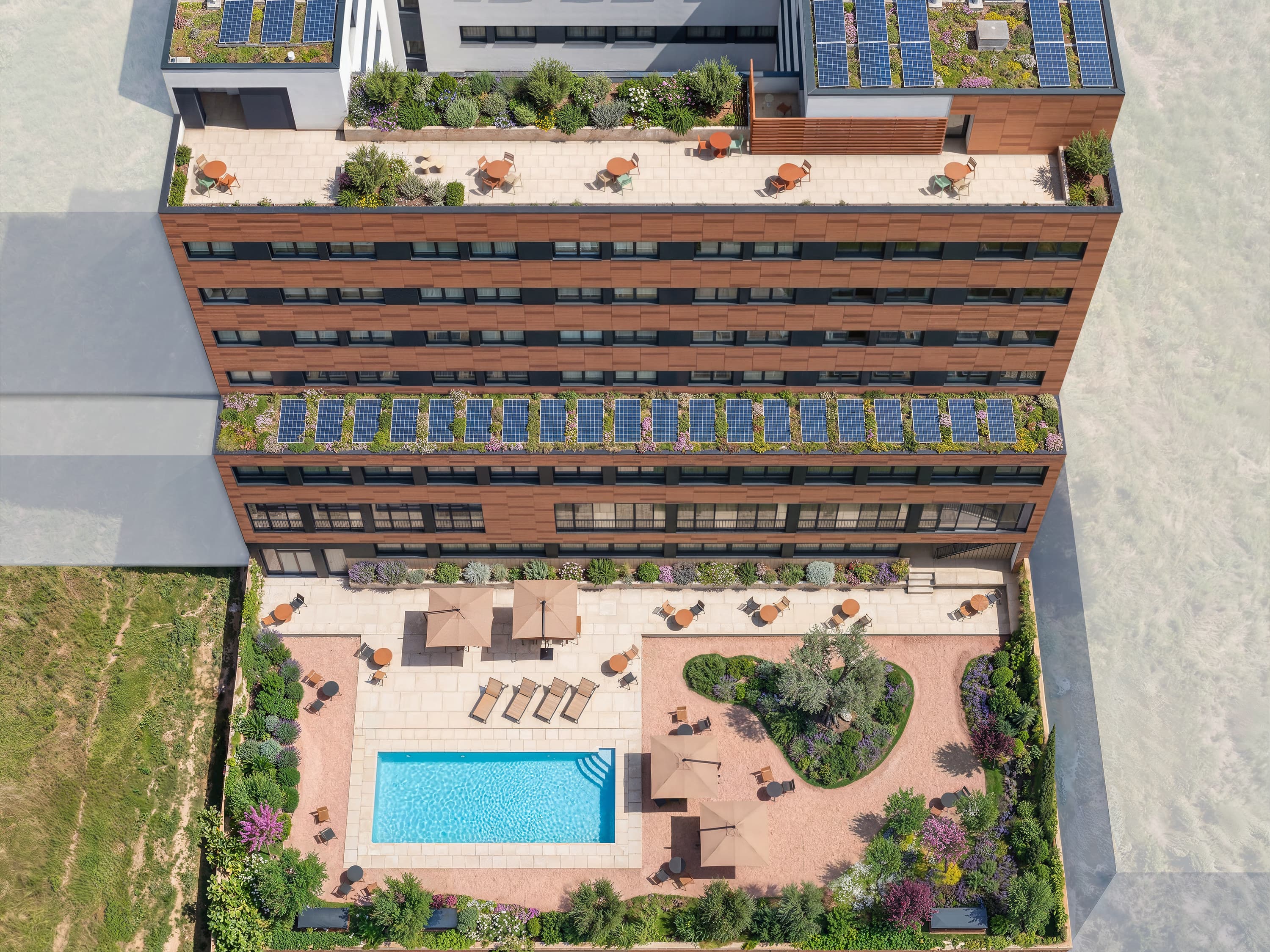 Visualización CGI aérea de Camplus Perú Poblenou con piscina y terraza