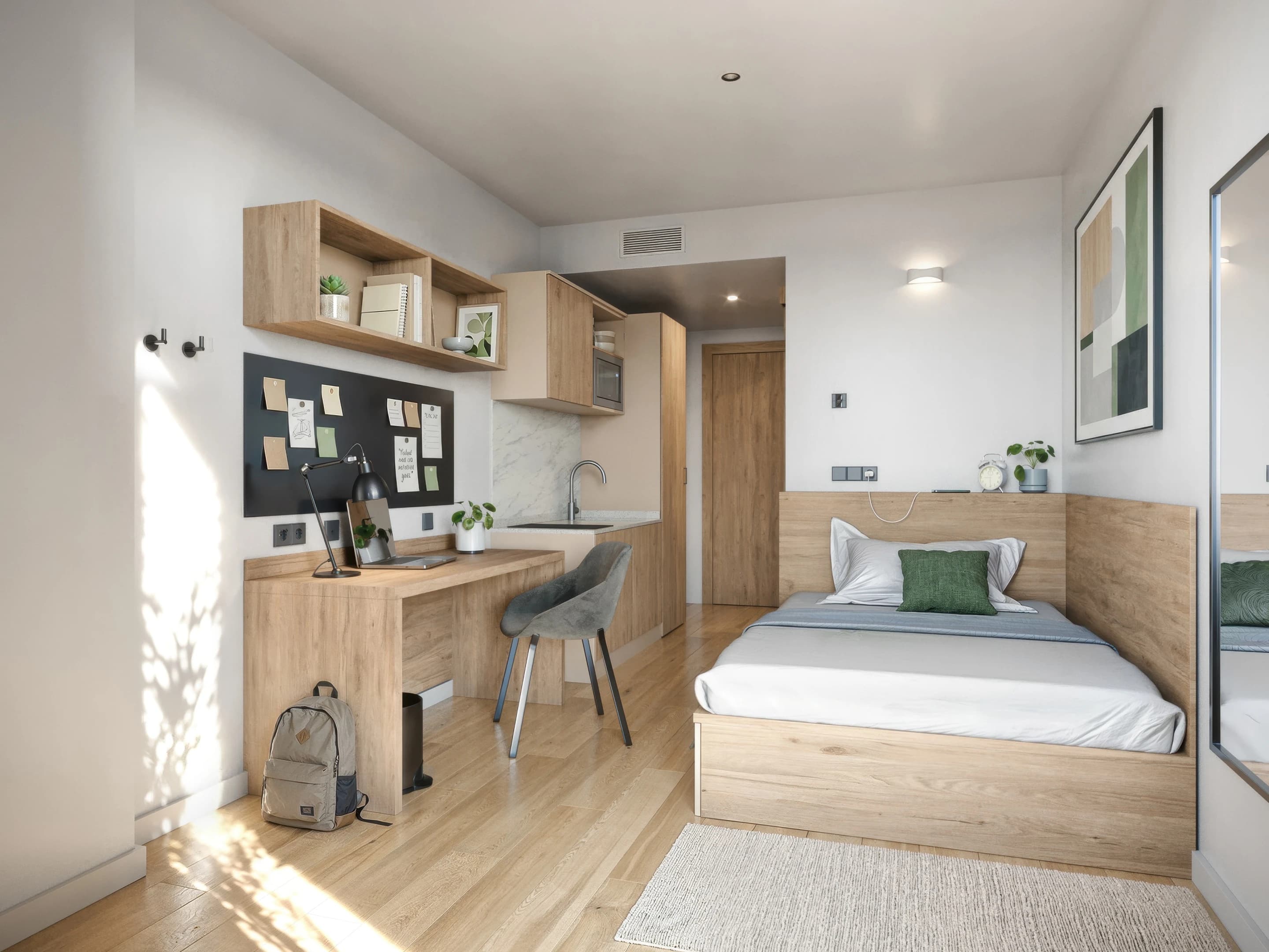 Visualización de habitación con cocina y escritorio · Residencia Camplus Perú Poblenou