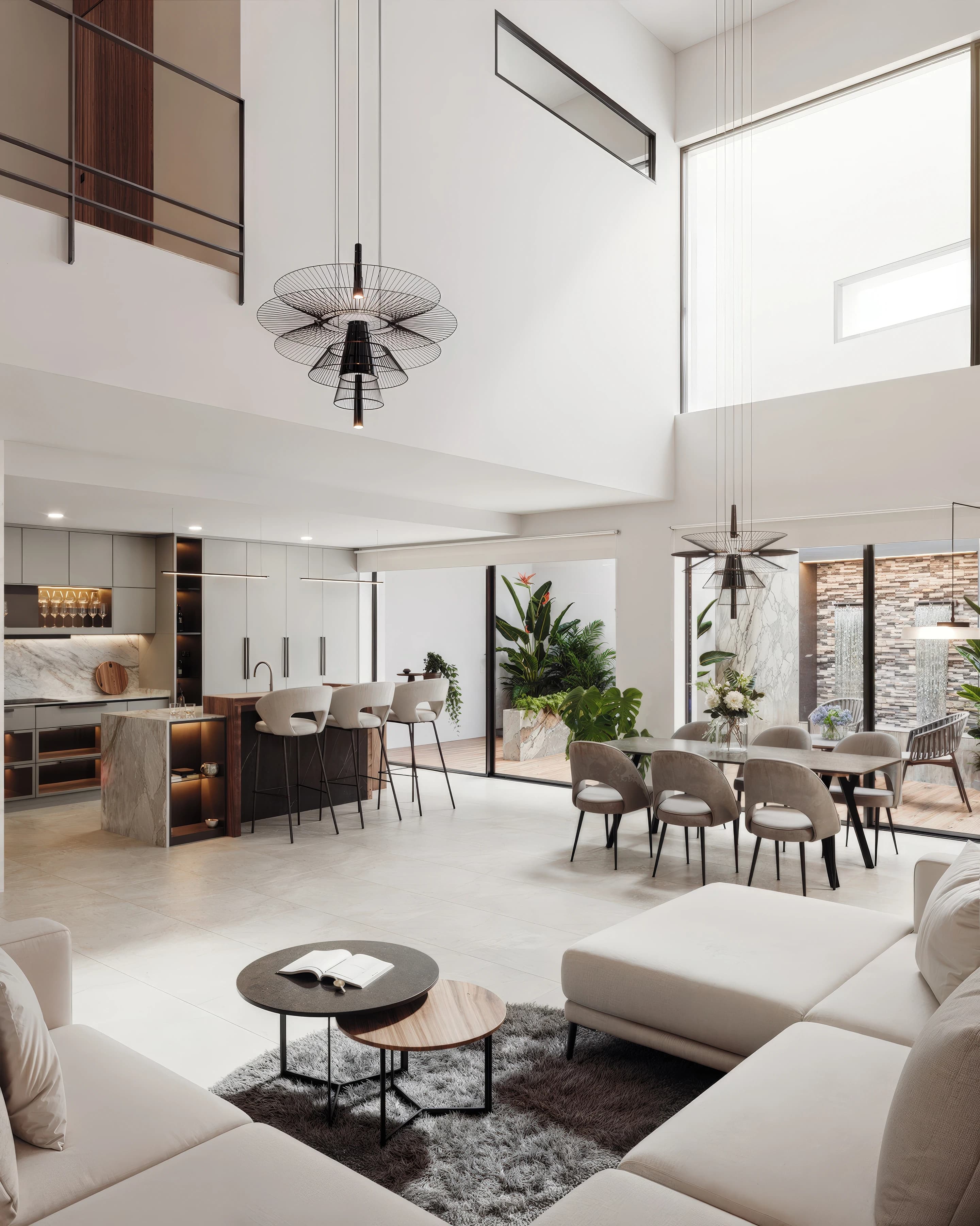 Visualización de cocina y comedor de doble altura · Vivienda Patio · Mar Marín Interiorismo